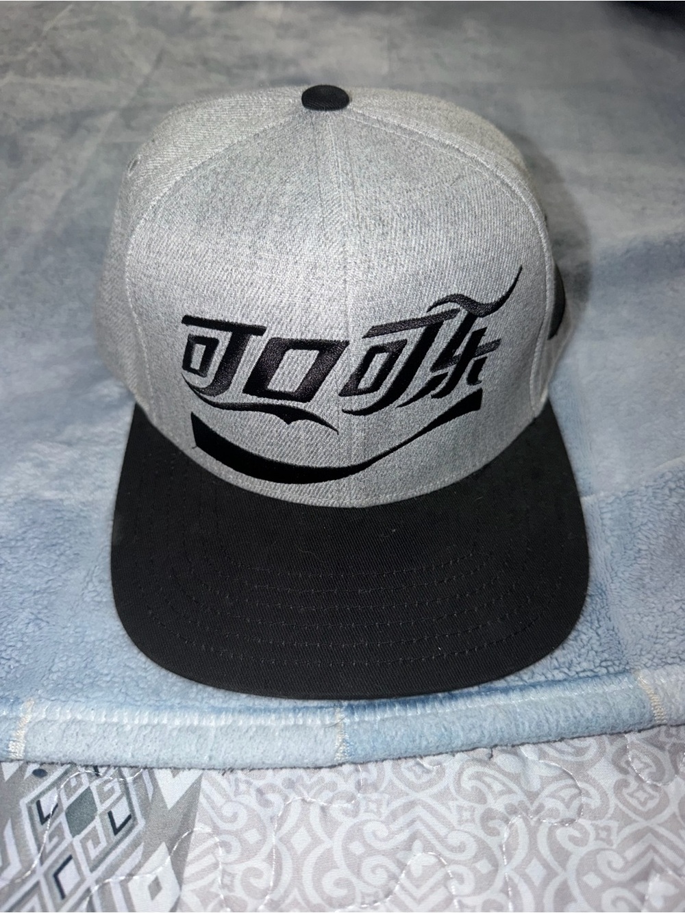 Grey and Black Snapback Hat with Graphic Logo